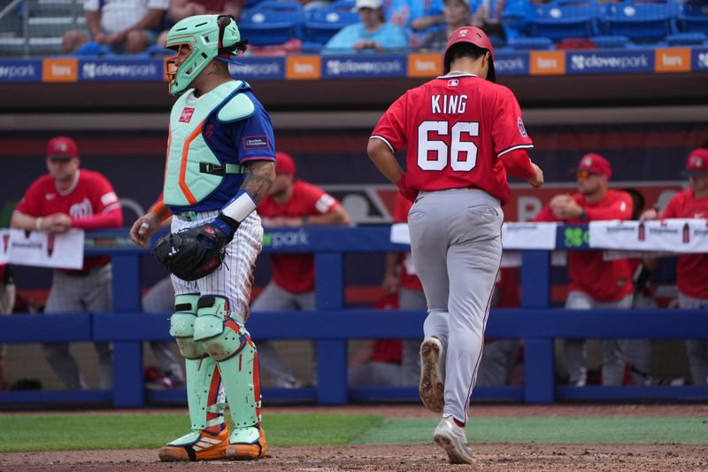Feb 28, 2026; Port St. Lucie, Florida, USA;  Washington Nationals second baseman Seaver King (66) scores a run in the sixth inning against the New York Mets at Clover Park. Mandatory Credit: Jim Rassol-Imagn Images