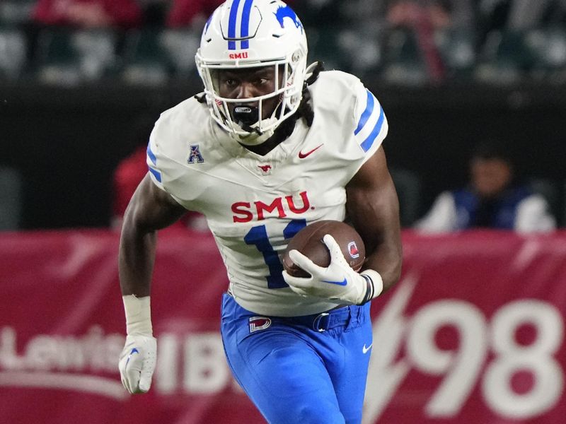 Oct 20, 2023; Philadelphia, Pennsylvania, USA; SMU Mustangs running back LJ Johnson Jr. (11) runs with the ball against the Temple Owls during the first half at Lincoln Financial Field. Mandatory Credit: Gregory Fisher-USA TODAY Sports