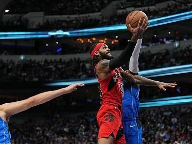 DALLAS, TX - NOVEMBER 8: Gary Trent Jr. #33 of the Toronto Raptors drives to the basket during the game against the Dallas Mavericks on November 8, 2023 at the American Airlines Center in Dallas, Texas. NOTE TO USER: User expressly acknowledges and agrees that, by downloading and or using this photograph, User is consenting to the terms and conditions of the Getty Images License Agreement. Mandatory Copyright Notice: Copyright 2023 NBAE (Photo by Glenn James/NBAE via Getty Images)