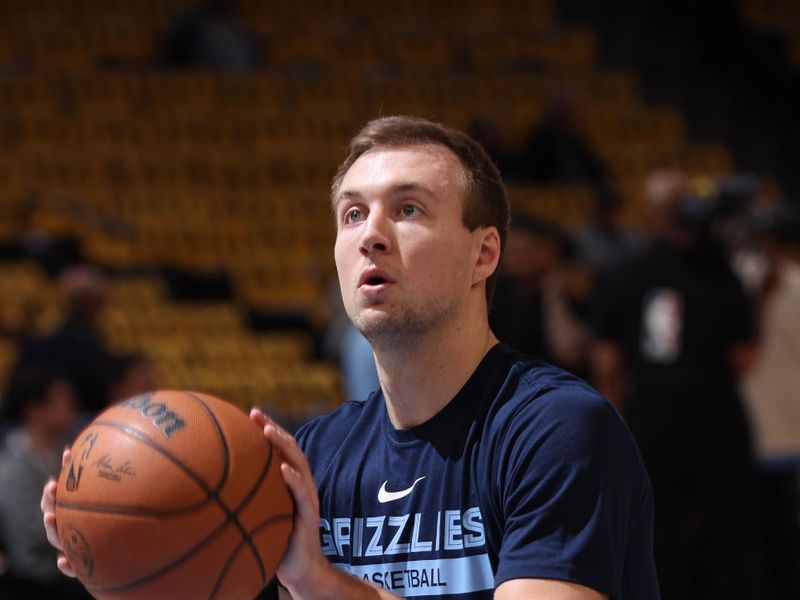 MEMPHIS, TN - APRIL 19: Luke Kennard #10 of the Memphis Grizzlies warms up before the game against the Los Angeles Lakers during Round One Game Two of the 2023 NBA Playoffs on April 19, 2023 at FedExForum in Memphis, Tennessee. NOTE TO USER: User expressly acknowledges and agrees that, by downloading and or using this photograph, User is consenting to the terms and conditions of the Getty Images License Agreement. Mandatory Copyright Notice: Copyright 2023 NBAE (Photo by Joe Murphy/NBAE via Getty Images)