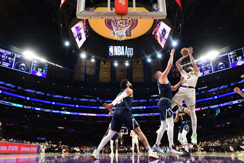 LOS ANGELES, CA - APRIL 27: Anthony Davis #3 of the Los Angeles Lakers drives to the basket during the game against the Denver Nuggets during Round 1 Game 4 of the 2024 NBA Playoffs on April 27, 2024 at Crypto.Com Arena in Los Angeles, California. NOTE TO USER: User expressly acknowledges and agrees that, by downloading and/or using this Photograph, user is consenting to the terms and conditions of the Getty Images License Agreement. Mandatory Copyright Notice: Copyright 2024 NBAE (Photo by Adam Pantozzi/NBAE via Getty Images)