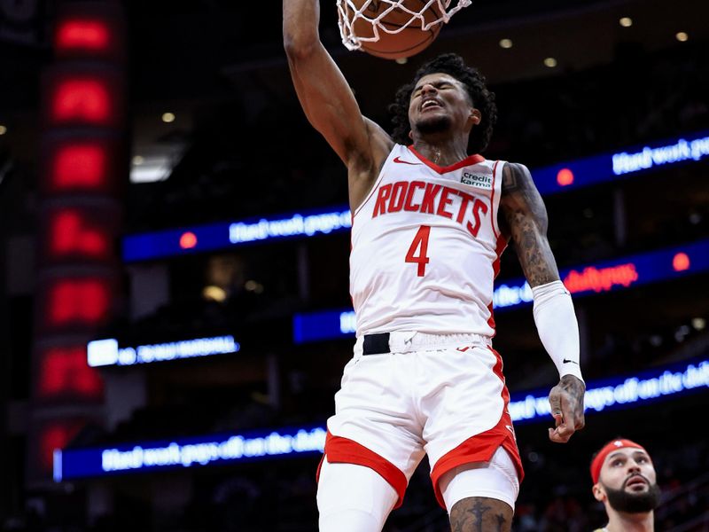 HOUSTON, TEXAS - JANUARY 31: Jalen Green #4 of the Houston Rockets dunks the ball against the New Orleans Pelicans during the first half at Toyota Center on January 31, 2024 in Houston, Texas. NOTE TO USER: User expressly acknowledges and agrees that, by downloading and or using this photograph, User is consenting to the terms and conditions of the Getty Images License Agreement.? (Photo by Carmen Mandato/Getty Images)