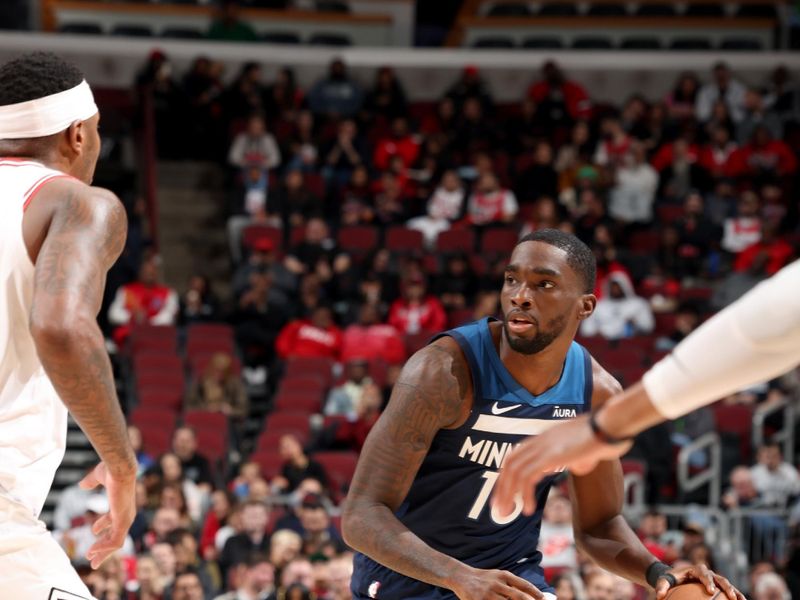 CHICAGO, IL - OCTOBER 19: Shake Milton #18 of the Minnesota Timberwolves dribbles the ball during the game against the Chicago Bulls on October 19, 2023 at United Center in Chicago, Illinois. NOTE TO USER: User expressly acknowledges and agrees that, by downloading and or using this photograph, User is consenting to the terms and conditions of the Getty Images License Agreement. Mandatory Copyright Notice: Copyright 2023 NBAE (Photo by Jeff Haynes/NBAE via Getty Images)