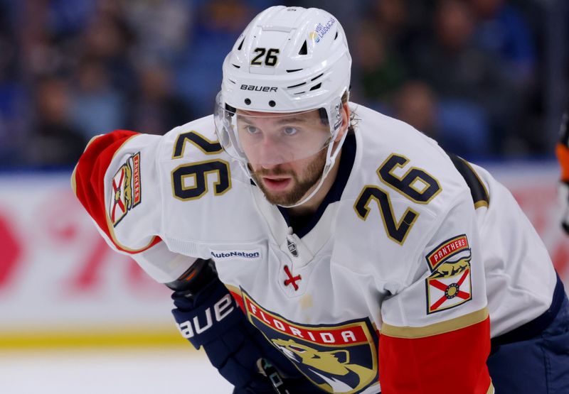 Oct 28, 2024; Buffalo, New York, USA;  Florida Panthers defenseman Uvis Balinskis (26) waits for the face-off during the third period against the Buffalo Sabres at KeyBank Center. Mandatory Credit: Timothy T. Ludwig-Imagn Images