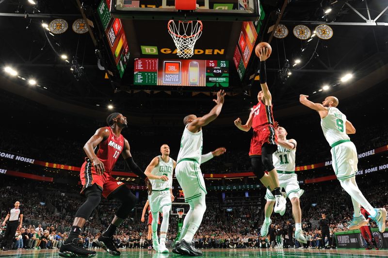 BOSTON, MA - APRIL 21: Tyler Herro #14 of the Miami Heat drives to the basket during the game against the Boston Celtics during Round 1 Game 1 of the 2024 NBA Playoffs on April 21, 2024 at the TD Garden in Boston, Massachusetts. NOTE TO USER: User expressly acknowledges and agrees that, by downloading and or using this photograph, User is consenting to the terms and conditions of the Getty Images License Agreement. Mandatory Copyright Notice: Copyright 2024 NBAE  (Photo by Brian Babineau/NBAE via Getty Images)