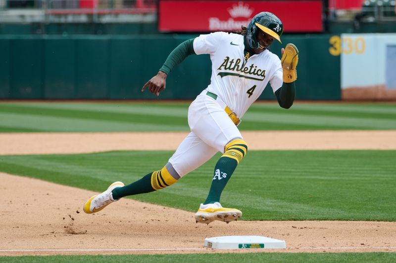 Apr 14, 2024; Oakland, California, USA; Oakland Athletics outfielder Lawrence Butler (4) rounds third base to score a run against the Washington Nationals during the fifth inning at Oakland-Alameda County Coliseum. Mandatory Credit: Robert Edwards-USA TODAY Sports