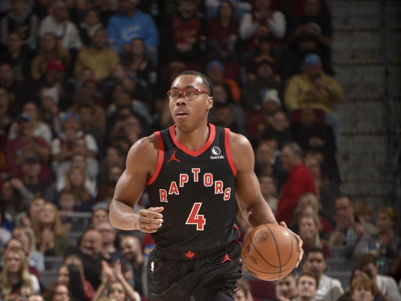 CLEVELAND, OH - NOVEMBER 24: Scottie Barnes #4 of the Toronto Raptors dribbles the ball during the game against the Cleveland Cavaliers on November 24, 2024 at Rocket Mortgage FieldHouse in Cleveland, Ohio. NOTE TO USER: User expressly acknowledges and agrees that, by downloading and/or using this Photograph, user is consenting to the terms and conditions of the Getty Images License Agreement. Mandatory Copyright Notice: Copyright 2024 NBAE (Photo by David Liam Kyle/NBAE via Getty Images)