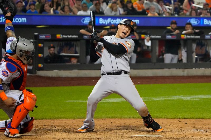 Jul 2, 2023; New York City, New York, USA; San Francisco Giants first baseman Wilmer Flores (41) reacts to being brushed back by a pitch during the eighth inning against the New York Mets at Citi Field. Mandatory Credit: Gregory Fisher-USA TODAY Sports