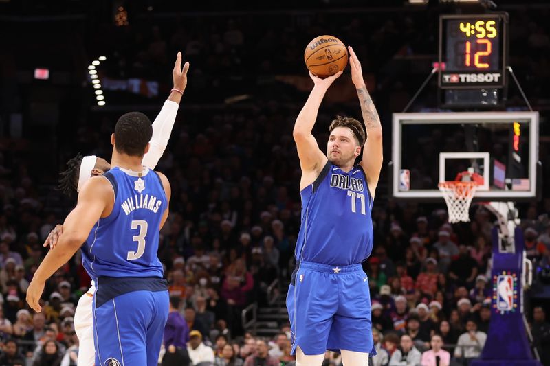 PHOENIX, ARIZONA - DECEMBER 25: Luka Doncic #77 of the Dallas Mavericks puts up a three-point shot against the Phoenix Suns during the first half of the NBA game at Footprint Center on December 25, 2023 in Phoenix, Arizona. With this basket, Doncic surpassed 10,000 career points.  The Mavericks defeated the Suns 128-114. NOTE TO USER: User expressly acknowledges and agrees that, by downloading and or using this photograph, User is consenting to the terms and conditions of the Getty Images License Agreement.  (Photo by Christian Petersen/Getty Images)