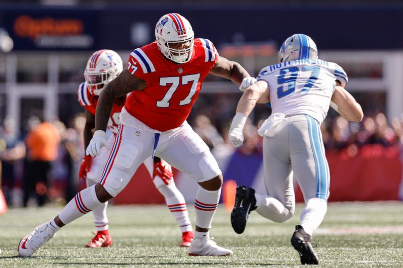 New England Patriots offensive tackle Trent Brown looks to block Detroit Lions' Aidan Hutchinson during an NFL football game at Gillette Stadium, Sunday, Oct. 9, 2022 in Foxborough, Mass. (Winslow Townson/AP Images for Panini)