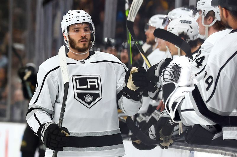 Feb 17, 2024; Boston, Massachusetts, USA; Los Angeles Kings defenseman Matt Roy (3) is congratulated at the bench after scoring against the Boston Bruins during the first period at TD Garden. Mandatory Credit: Winslow Townson-USA TODAY Sports