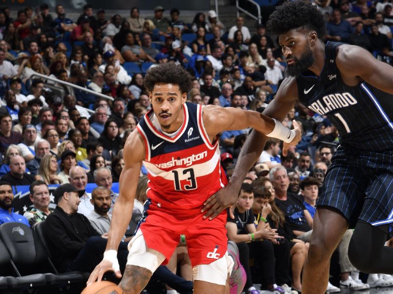 ORLANDO, FL - NOVMEBER 10: Jordan Poole #13 of the Washington Wizards drives to the basket during the game against the Orlando Magic on November 10, 2024 at Kia Center in Orlando, Florida. NOTE TO USER: User expressly acknowledges and agrees that, by downloading and or using this photograph, User is consenting to the terms and conditions of the Getty Images License Agreement. Mandatory Copyright Notice: Copyright 2024 NBAE (Photo by Fernando Medina/NBAE via Getty Images)