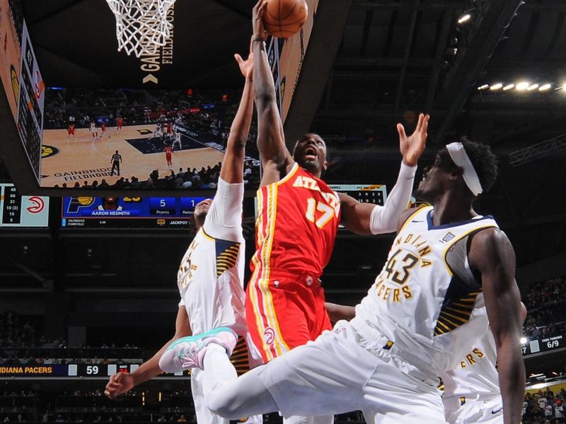 INDIANAPOLIS, IN - FEBRUARY 1: Onyeka Okongwu #17 of the Atlanta Hawks drives to the basket during the game against the Indiana Pacers on February 1, 2025 at Gainbridge Fieldhouse in Indianapolis, Indiana. NOTE TO USER: User expressly acknowledges and agrees that, by downloading and or using this Photograph, user is consenting to the terms and conditions of the Getty Images License Agreement. Mandatory Copyright Notice: Copyright 2025 NBAE (Photo by Ron Hoskins/NBAE via Getty Images)