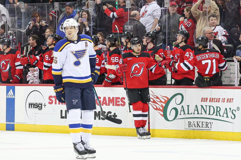 Mar 7, 2024; Newark, New Jersey, USA; New Jersey Devils right wing Timo Meier (28) celebrates his third goal with teammates of the game during the second period against the St. Louis Blues at Prudential Center. Mandatory Credit: Vincent Carchietta-USA TODAY Sports