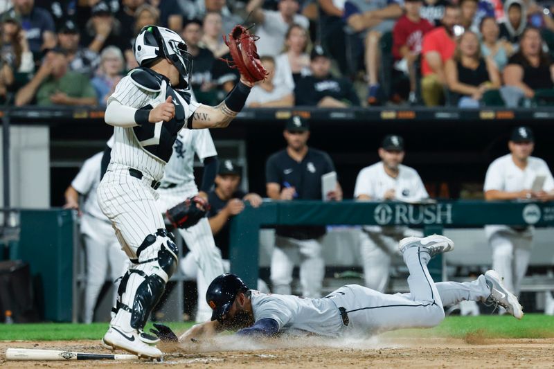 Aug 23, 2024; Chicago, Illinois, USA; Detroit Tigers outfielder Riley Greene (31) scores against the Chicago White Sox during the seventh inning at Guaranteed Rate Field. Mandatory Credit: Kamil Krzaczynski-USA TODAY Sports