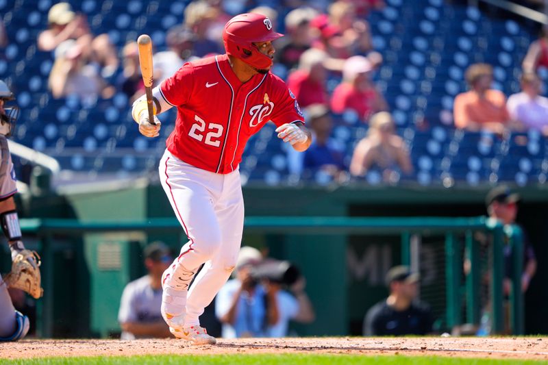 Sep 3, 2023; Washington, District of Columbia, USA;  Washington Nationals first baseman Dominic Smith (22) hits a RBI double against the Miami Marlins during the fifth inning at Nationals Park. Mandatory Credit: Gregory Fisher-USA TODAY Sports