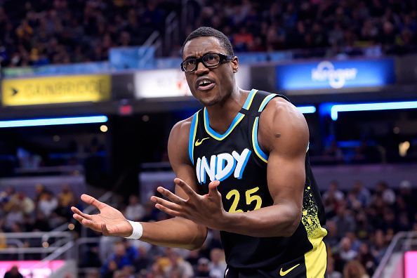 INDIANAPOLIS, INDIANA - DECEMBER 23: Jalen Smith #25 of the Indiana Pacers reacts after a play during the first half in the game against the Orlando Magic at Gainbridge Fieldhouse on December 23, 2023 in Indianapolis, Indiana. NOTE TO USER: User expressly acknowledges and agrees that, by downloading and or using this photograph, User is consenting to the terms and conditions of the Getty Images License Agreement. (Photo by Justin Casterline/Getty Images)