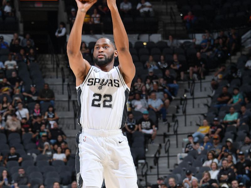 SAN ANTONIO, TX - OCTOBER 9: Malaki Branham #22 of the San Antonio Spurs shoots a three point basket during the game against the Orlando Magic during a NBA preseason game on October 9, 2024 at the Frost Bank Center in San Antonio, Texas. NOTE TO USER: User expressly acknowledges and agrees that, by downloading and or using this photograph, user is consenting to the terms and conditions of the Getty Images License Agreement. Mandatory Copyright Notice: Copyright 2024 NBAE (Photos by Michael Gonzales/NBAE via Getty Images)