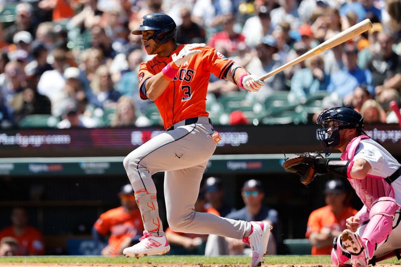 May 12, 2024; Detroit, Michigan, USA;  Houston Astros shortstop Jeremy Pena (3) hits a single in the first inning against the Detroit Tigers at Comerica Park. Mandatory Credit: Rick Osentoski-USA TODAY Sports