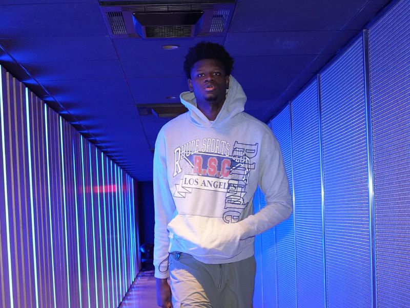 PHILADELPHIA, PA - JANUARY 12:  Mo Bamba #7 of the Philadelphia 76ers arrives to the arena before the game on January 12, 2024 at the Wells Fargo Center in Philadelphia, Pennsylvania NOTE TO USER: User expressly acknowledges and agrees that, by downloading and/or using this Photograph, user is consenting to the terms and conditions of the Getty Images License Agreement. Mandatory Copyright Notice: Copyright 2024 NBAE (Photo by Jesse D. Garrabrant/NBAE via Getty Images)