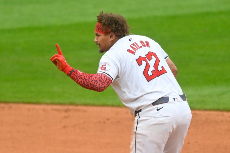 Jul 4, 2024; Cleveland, Ohio, USA; Cleveland Guardians first baseman Josh Naylor (22) celebrates his double in the fifth inning against the Chicago White Sox at Progressive Field. Mandatory Credit: David Richard-USA TODAY Sports