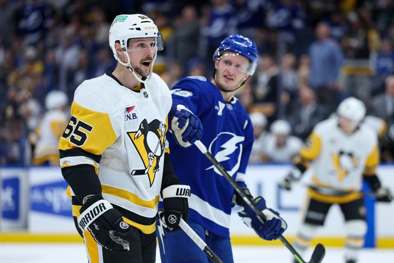 Dec 4, 2025; Tampa, Florida, USA; Pittsburgh Penguins defenseman Erik Karlsson (65) reacts after penalty call against the Tampa Bay Lightning in the first period at Benchmark International Arena. Mandatory Credit: Nathan Ray Seebeck-Imagn Images