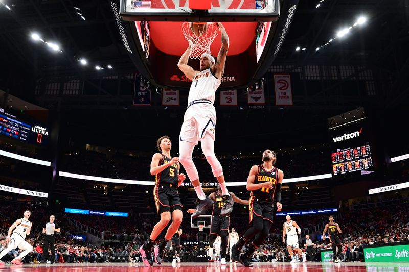 ATLANTA, GA - DECEMBER 8: Michael Porter Jr. #1 of the Denver Nuggets dunks the ball during the game against the Atlanta Hawks on December 8, 2024 at State Farm Arena in Atlanta, Georgia.  NOTE TO USER: User expressly acknowledges and agrees that, by downloading and/or using this Photograph, user is consenting to the terms and conditions of the Getty Images License Agreement. Mandatory Copyright Notice: Copyright 2024 NBAE (Photo by Adam Hagy/NBAE via Getty Images)