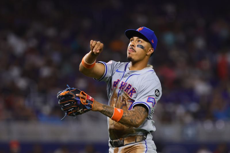 Jul 19, 2024; Miami, Florida, USA; New York Mets third baseman Mark Vientos (27) looks on against the Miami Marlins after the third inning at loanDepot Park. Mandatory Credit: Sam Navarro-USA TODAY Sports