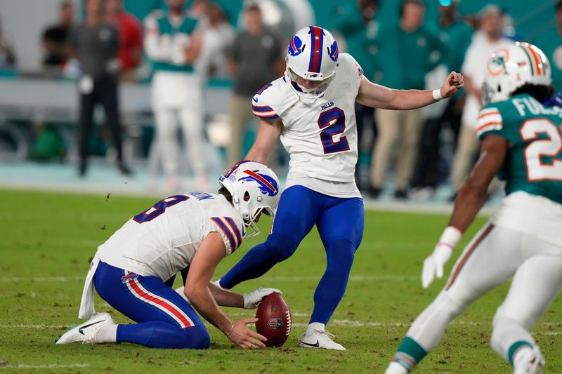 Buffalo Bills place kicker Tyler Bass (2) kicks a field goal during the first half of an NFL football game against the Miami Dolphins, Thursday, Sept. 12, 2024, in Miami Gardens, Fla. (AP Photo/Lynne Sladky)