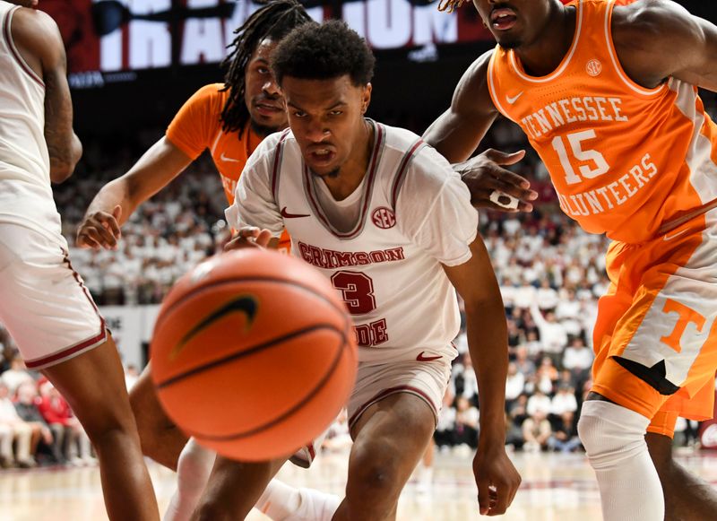 Mar 2, 2024; Tuscaloosa, Alabama, USA;  Tennessee forward Jonas Aiddo (0), Alabama guard Rylan Griffen (3) and Tennessee guard Jahmai Mashack (15) go for a loose ball at Coleman Coliseum. Mandatory Credit: Gary Cosby Jr.-USA TODAY Sports