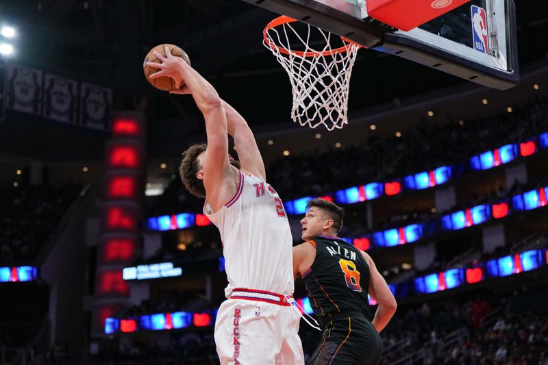 HOUSTON, TEXAS - DECEMBER 27: Alperen Sengun #28 of the Houston Rockets goes up for a dunk during the third quarter of the game against the Phoenix Suns at Toyota Center on December 27, 2023 in Houston, Texas. User expressly acknowledges and agrees that, by downloading and or using this photograph, User is consenting to the terms and conditions of the Getty Images License Agreement. (Photo by Alex Bierens de Haan/Getty Images)