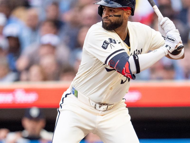 May 24, 2024; Minneapolis, Minnesota, USA; Minnesota Twins left field Willi Castro (50) at bat against Texas Rangers pitcher Jose Urena (54) in the second inning at Target Field. Mandatory Credit: Matt Blewett-USA TODAY Sports