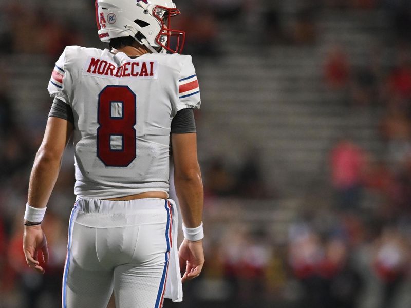 Sep 17, 2022; College Park, Maryland, USA;  Southern Methodist Mustangs quarterback Tanner Mordecai (8) stand son the field during the first half against the Maryland Terrapins at Capital One Field at Maryland Stadium. Mandatory Credit: Tommy Gilligan-USA TODAY Sports