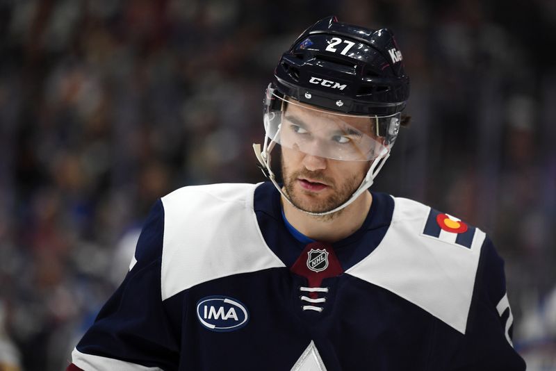 Jan 31, 2025; Denver, Colorado, USA; Colorado Avalanche left wing Jonathan Drouin (27) skates after the whistle during the second period against the St. Louis Blues at Ball Arena. Mandatory Credit: Christopher Hanewinckel-Imagn Images