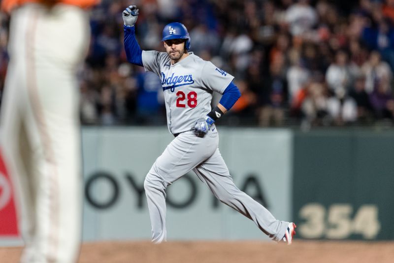 Sep 29, 2023; San Francisco, California, USA; Los Angeles Dodgers designated hitter J.D. Martinez (28) reacts after hitting a three-run home run against the San Francisco Giants during the sixth inning at Oracle Park. Mandatory Credit: John Hefti-USA TODAY Sports