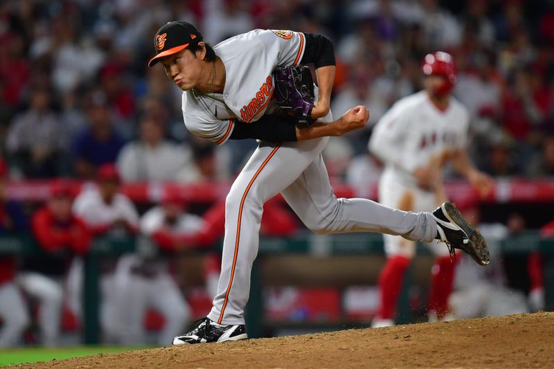 Sep 5, 2023; Anaheim, California, USA; Baltimore Orioles relief pitcher Shintaro Fujinami (14) throws against the Los Angeles Angels during the tenth inning at Angel Stadium. Mandatory Credit: Gary A. Vasquez-USA TODAY Sports