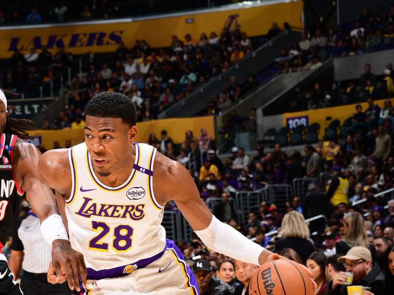 LOS ANGELES, CA - DECEMBER 8: Rui Hachimura #28 of the Los Angeles Lakers drives to the basket during the game against the Portland Trail Blazers on December 8, 2024 at Crypto.Com Arena in Los Angeles, California. NOTE TO USER: User expressly acknowledges and agrees that, by downloading and/or using this Photograph, user is consenting to the terms and conditions of the Getty Images License Agreement. Mandatory Copyright Notice: Copyright 2024 NBAE (Photo by Adam Pantozzi/NBAE via Getty Images)