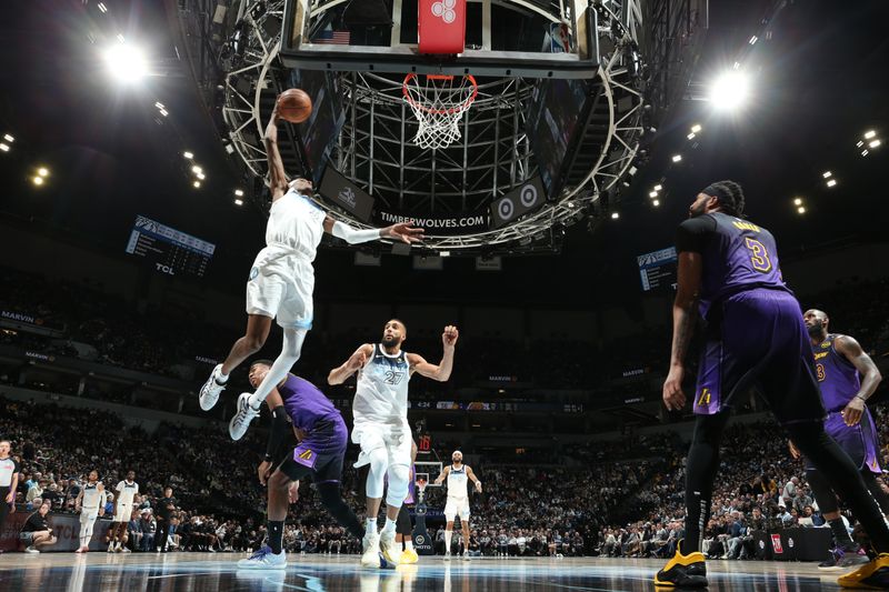 MINNEAPOLIS, MN -  DECEMBER 2: Jaden McDaniels #3 of the Minnesota Timberwolves drives to the basket during the game against the Los Angeles Lakers on December 2, 2024 at Target Center in Minneapolis, Minnesota. NOTE TO USER: User expressly acknowledges and agrees that, by downloading and or using this Photograph, user is consenting to the terms and conditions of the Getty Images License Agreement. Mandatory Copyright Notice: Copyright 2024 NBAE (Photo by David Sherman/NBAE via Getty Images)