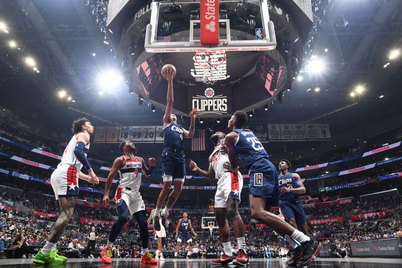 LOS ANGELES, CA - MARCH 1: Brandon Boston Jr. #4 of the LA Clippers drives to the basket during the game against the Washington Wizards on March 1, 2024 at Crypto.Com Arena in Los Angeles, California. NOTE TO USER: User expressly acknowledges and agrees that, by downloading and/or using this Photograph, user is consenting to the terms and conditions of the Getty Images License Agreement. Mandatory Copyright Notice: Copyright 2024 NBAE (Photo by Adam Pantozzi/NBAE via Getty Images)