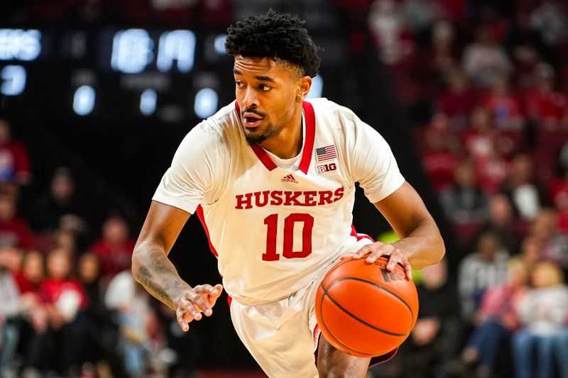 Dec 20, 2023; Lincoln, Nebraska, USA; Nebraska Cornhuskers guard Jamarques Lawrence (10) dribbles the ball against the North Dakota Fighting Hawks during the first half at Pinnacle Bank Arena. Mandatory Credit: Dylan Widger-USA TODAY Sports