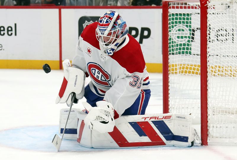 Nov 2, 2024; Pittsburgh, Pennsylvania, USA;  Montreal Canadiens goaltender Sam Montembeault (35) makes a save against the Pittsburgh Penguins during the first period at PPG Paints Arena. Mandatory Credit: Charles LeClaire-Imagn Images
