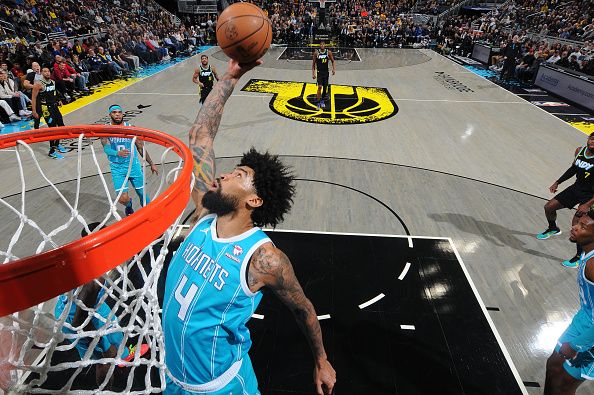 INDIANAPOLIS, IN - DECEMBER 20: Nick Richards #4 of the Charlotte Hornets grabs the rebound during the game against the Indiana Pacers on December 20, 2023 at Gainbridge Fieldhouse in Indianapolis, Indiana. NOTE TO USER: User expressly acknowledges and agrees that, by downloading and or using this Photograph, user is consenting to the terms and conditions of the Getty Images License Agreement. Mandatory Copyright Notice: Copyright 2023 NBAE (Photo by Ron Hoskins/NBAE via Getty Images)