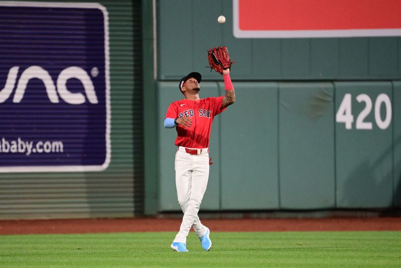 Jun 14, 2024; Boston, Massachusetts, USA;  Boston Red Sox center fielder Ceddanne Rafaela (43) makes a catch for an out during the seventh inning against the New York Yankees at Fenway Park. Mandatory Credit: Eric Canha-USA TODAY Sports