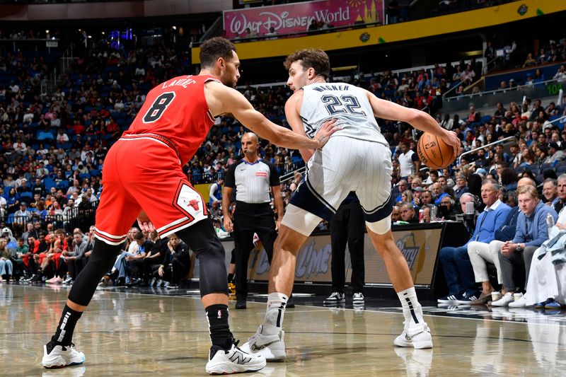 ORLANDO, FL - NOVEMBER 27: Franz Wagner #22 of the Orlando Magic handles the ball during the game against the Chicago Bulls on November 27, 2024 at Kia Center in Orlando, Florida. NOTE TO USER: User expressly acknowledges and agrees that, by downloading and or using this photograph, User is consenting to the terms and conditions of the Getty Images License Agreement. Mandatory Copyright Notice: Copyright 2024 NBAE (Photo by Fernando Medina/NBAE via Getty Images)