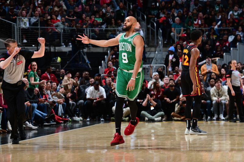 ATLANTA, GA - MARCH 28: Derrick White #9 of the Boston Celtics celebrates during the game against the Atlanta Hawks on March 28, 2024 at State Farm Arena in Atlanta, Georgia.  NOTE TO USER: User expressly acknowledges and agrees that, by downloading and/or using this Photograph, user is consenting to the terms and conditions of the Getty Images License Agreement. Mandatory Copyright Notice: Copyright 2024 NBAE (Photo by Scott Cunningham/NBAE via Getty Images)