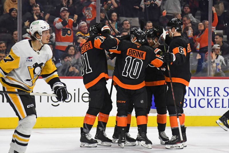 Feb 25, 2025; Philadelphia, Pennsylvania, USA; Philadelphia Flyers right wing Bobby Brink (10) celebrates his goal with teammates against the Pittsburgh Penguins during the second period at Wells Fargo Center. Mandatory Credit: Eric Hartline-Imagn Images