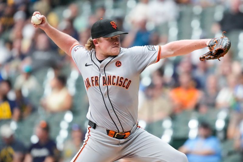 Aug 27, 2024; Milwaukee, Wisconsin, USA;  San Francisco Giants pitcher Logan Webb (62) throws a pitch during the first inning against the Milwaukee Brewers at American Family Field. Mandatory Credit: Jeff Hanisch-USA TODAY Sports