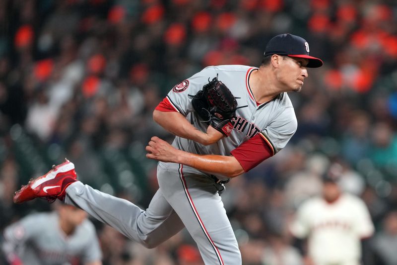 Apr 9, 2024; San Francisco, California, USA; Washington Nationals pitcher Robert Garcia (61) throws a pitch against the San Francisco Giants during the fifth inning at Oracle Park. Mandatory Credit: Darren Yamashita-USA TODAY Sports