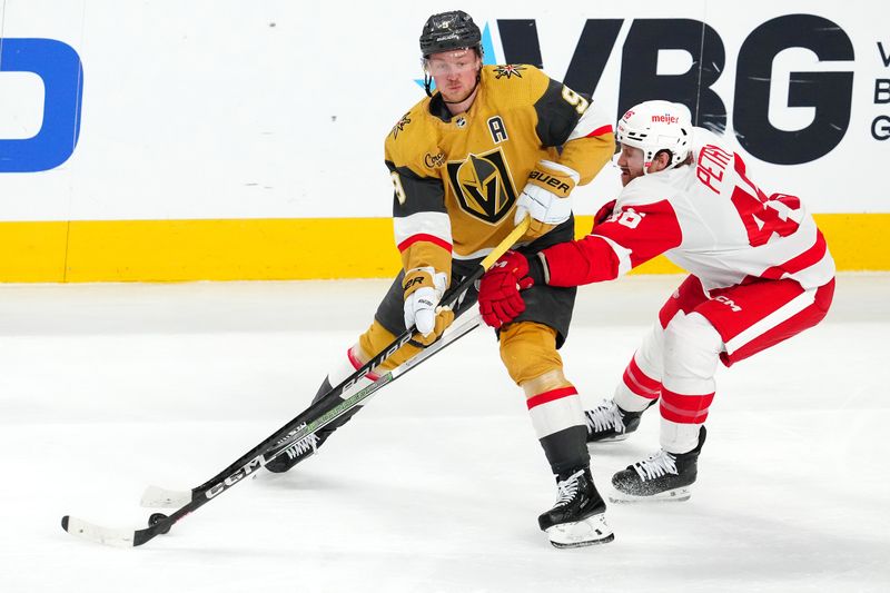 Mar 9, 2024; Las Vegas, Nevada, USA; Detroit Red Wings defenseman Jeff Petry (46) breaks up a pass attempt by Vegas Golden Knights center Jack Eichel (9) during the third period at T-Mobile Arena. Mandatory Credit: Stephen R. Sylvanie-USA TODAY Sports