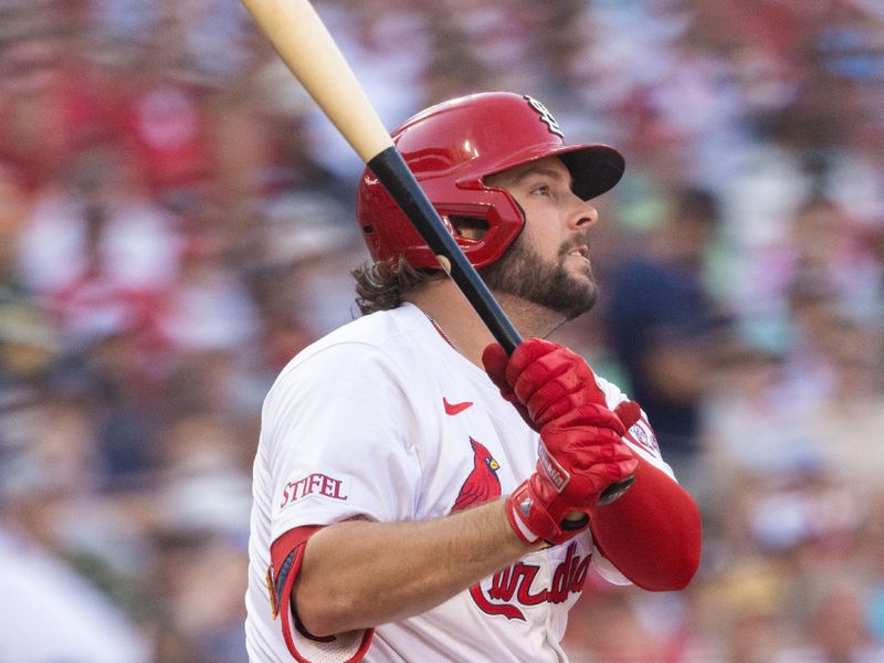 Jun 26, 2024; St. Louis, Missouri, USA; St. Louis Cardinals outfielder Alec Burleson (41) hits an RBI double against the Atlanta Braves in the third inning at Busch Stadium. Mandatory Credit: Zach Dalin-USA TODAY Sports